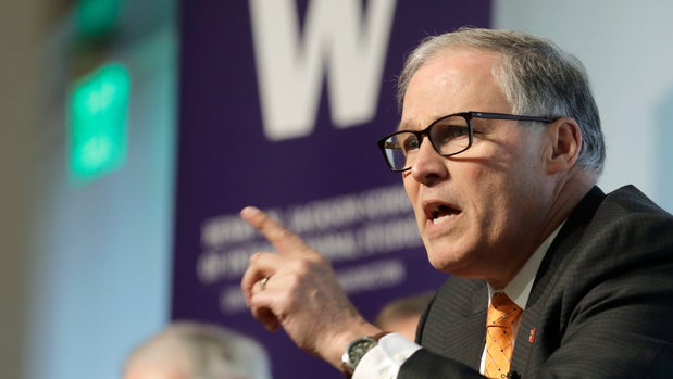 Washington Gov. Jay Inslee speaks Wednesday, March 6, 2019, during a non-partisan panel discussion titled "Foreign Affairs and National Security in the Age of Climate Change" hosted by the University of Washington Jackson School and the American Security Project on the UW campus in Seattle. Inslee announced last week that he would be seeking the Democratic nomination for President. (AP Photo/Ted S. Warren)