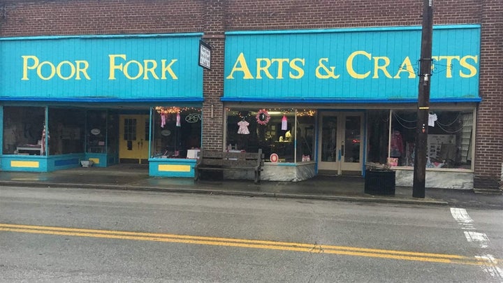 Poor Fork Arts & Crafts in Cumberland, Kentucky, sells Appalachian handcrafted and vintage items. The store is on a stret