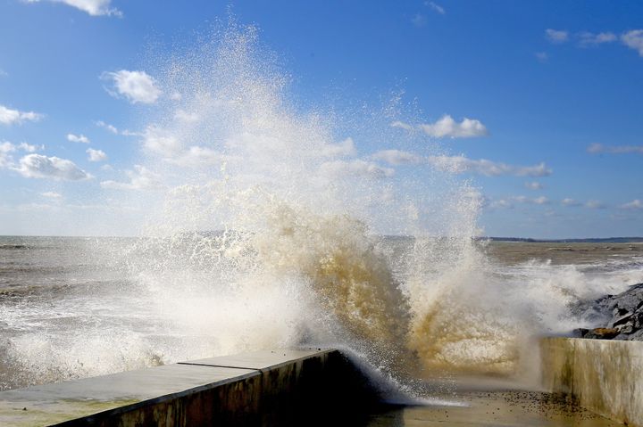 Waves crash against the sea defences in Camber, East Sussex, as the unsettled and windy weather continues across the UK. 