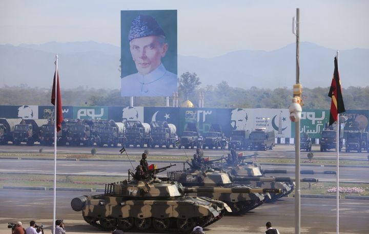 Pakistani armed forces in tanks take part during the Pakistan Day military parade in Islamabad.