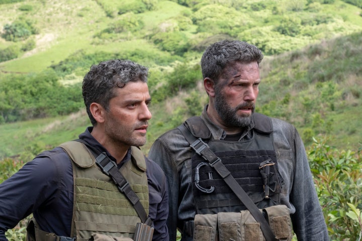 Oscar Isaac and Ben Affleck in "Triple Frontier" on Netflix.