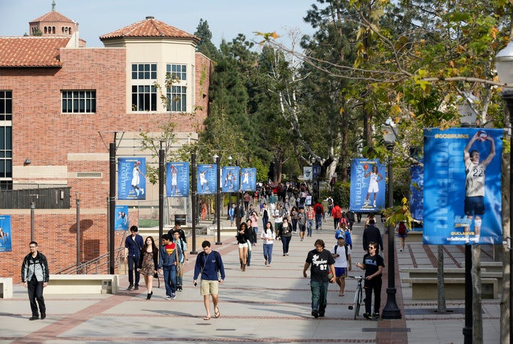 In this Feb. 26, 2015, file photo, students walk on the University of California, Los Angeles campus.