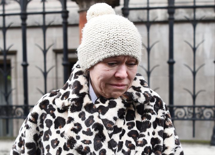 A distraught Tina Malone leaves London's High Court on Wednesday.