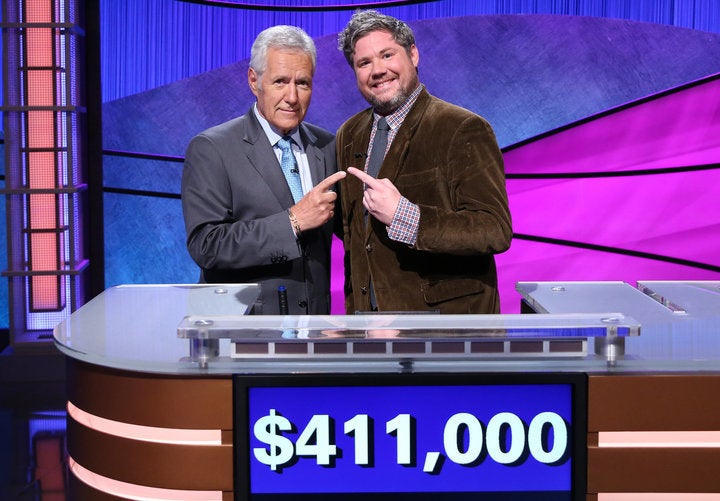 “Jeopardy!” host Alex Trebek and contestant Austin Rogers, who took home $463,000 after first appearing on the sh