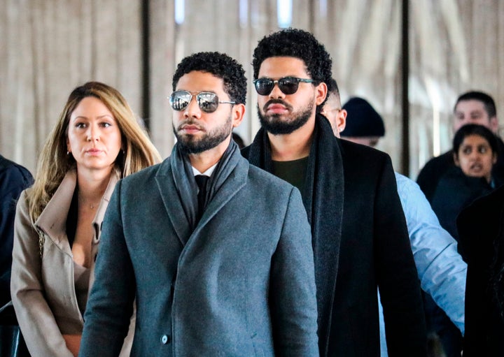 Smollett and team arrive for a court hearing at the Leighton Criminal Courthouse on March 12 in Chicago.