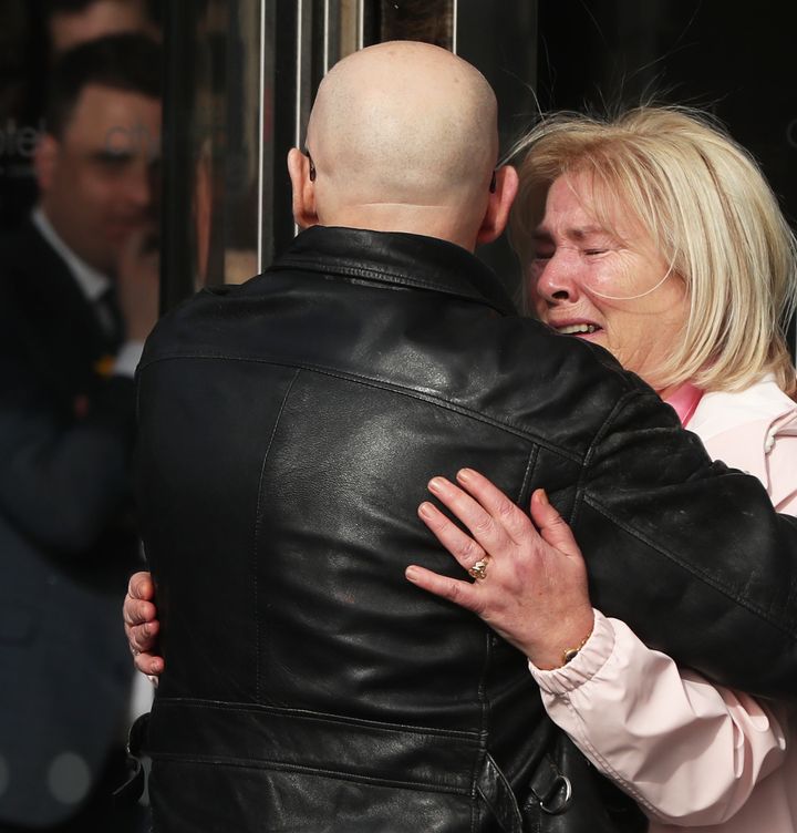 Linda Nash whose youngest brother William Nash died on Bloody Sunday with Eamonn McCann outside the city hotel Londonderry, Northern Ireland ahead of the announcement.
