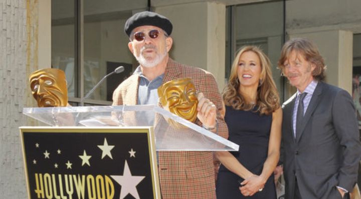 David Mamet spoke in 2012 when Felicity Huffman and husband William H. Macy (in the background) received their stars on the Hollywood Walk of Fame.