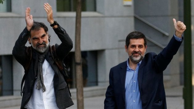 Jordi Cuixart y Jordi Sánchez, antes de declarar en Madrid.