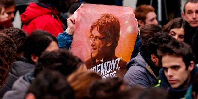 Un cartel de Puigdemont en una manifestación.