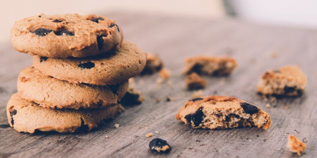 Chocolate chip cookies on old wooden table