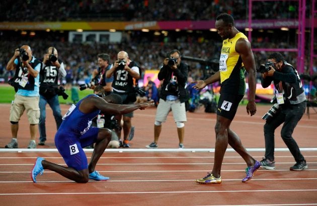 Athletics - World Athletics Championships â menâs 100 m final â London Stadium, London, Britain â August 5, 2017 â Justin Gatlin of the U.S. and Usain Bolt of Jamaica react after the race. REUTERS/Phil Noble