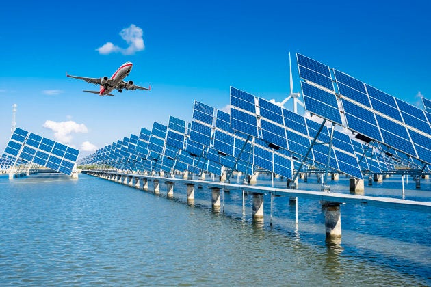 solar energy panels and wind turbines at shanghai china..