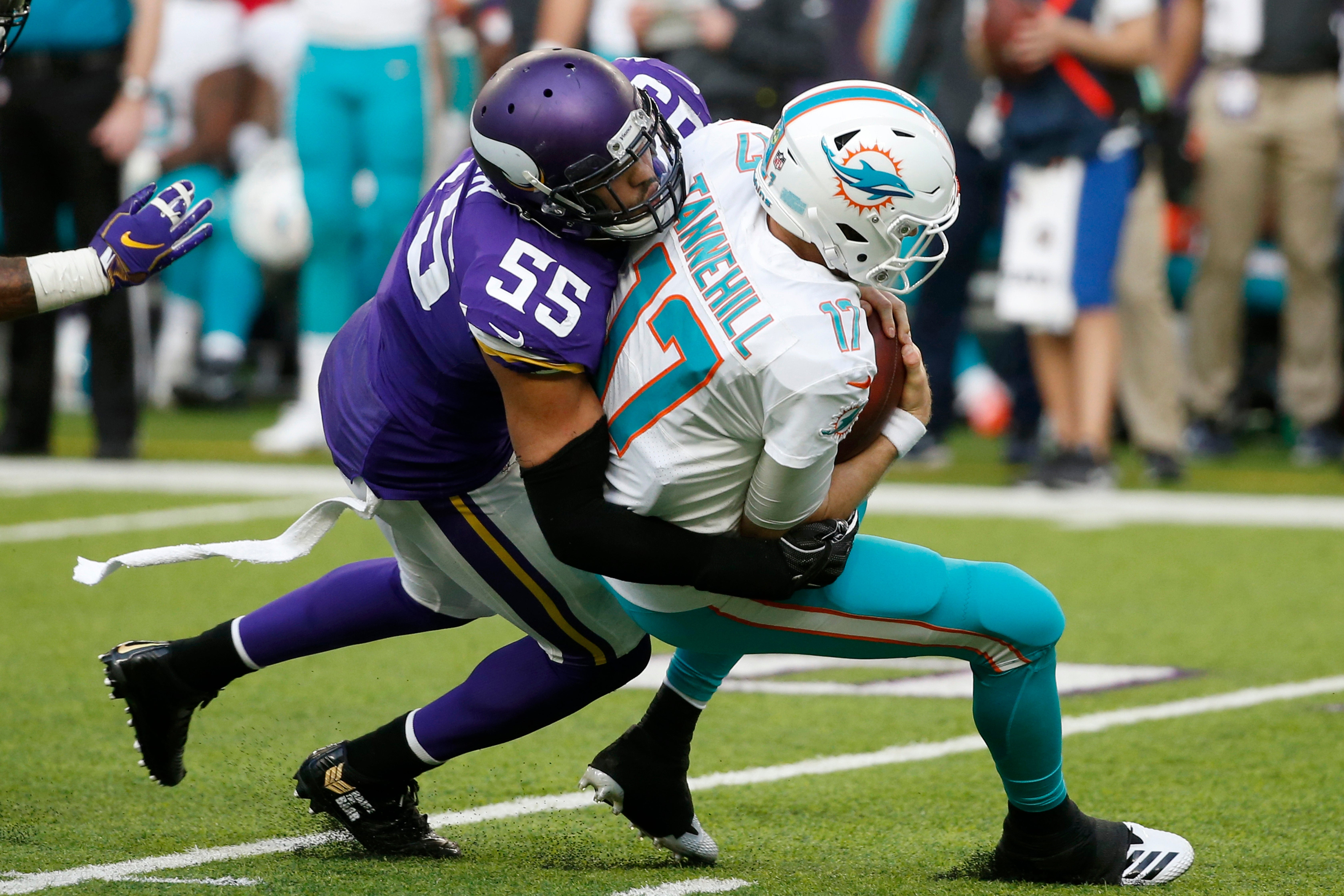 Miami Dolphins quarterback Ryan Tannehill is sacked by Minnesota Vikings outside linebacker Anthony Barr. (AP)