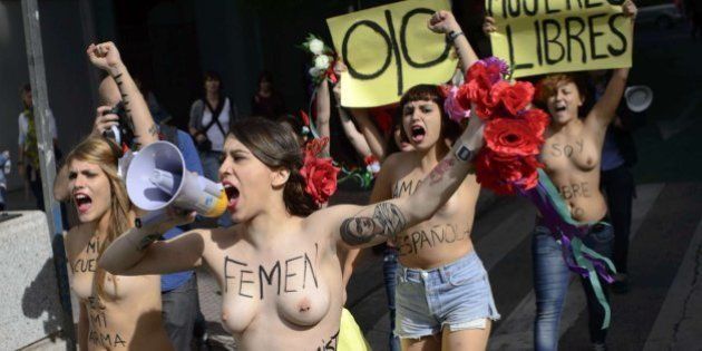 Cumbre Femen por las calles de Madrid en el día de la Fiesta Nacional