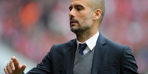 MUNICH, GERMANY - MAY 09: Josep Guardiola, head coach of Munich looks on prior to the Bundesliga match between FC Bayern Muenchen and FC Augsburg at Allianz Arena on May 9, 2015 in Munich, Germany. (Photo by Lennart Preiss/Bongarts/Getty Images)