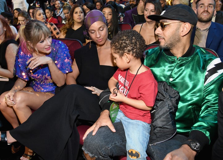 Taylor Swift, Alicia Keys, and Swizz Beatz attend the 2019 iHeartRadio Music Awards which broadcasted live on FOX at Microsof