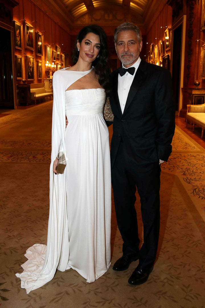Amal and George Clooney attend a dinner to celebrate The Prince's Trust, hosted by Prince Charles, at Buckingham Palace on Ma