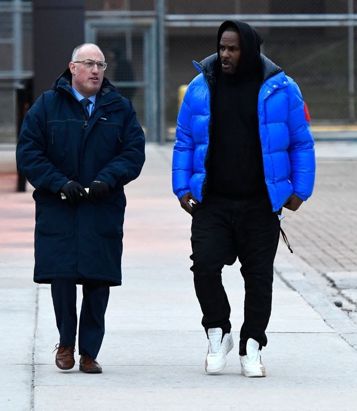 R. Kelly, right, leaves Cook County Jail with his defense attorney, Steve Greenberg, Monday, Feb. 25, 2019, in Chicago. 