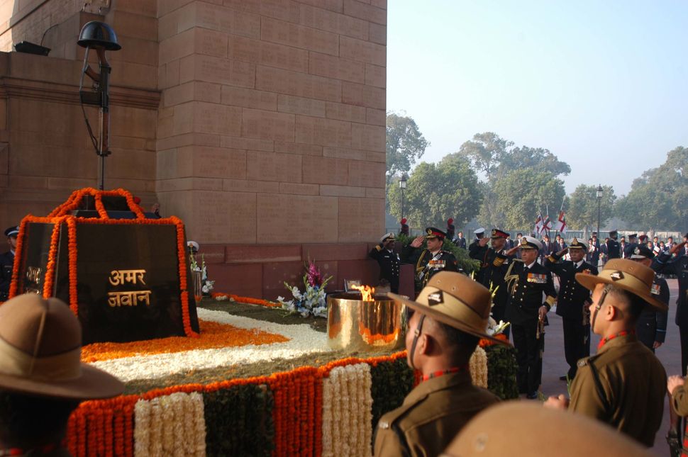 Jawans at the Amar Jawan Jyoti on the occasion of the Indian Navy Day.