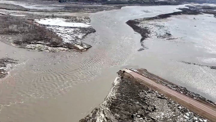 Highway 12 is seen damaged after a storm triggered historic flooding, over Niobrara River, Neb., on March 16, 2019. 