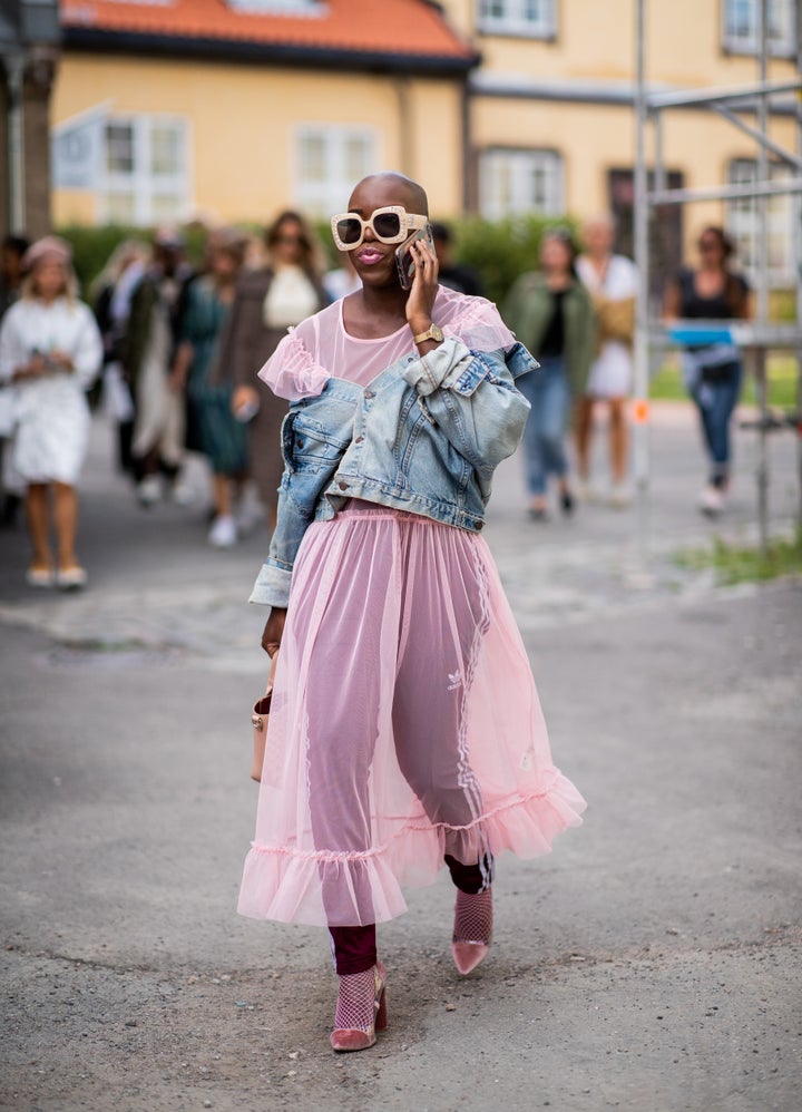 How To Wear The SkirtsOverPants Trend That's Everywhere Right Now