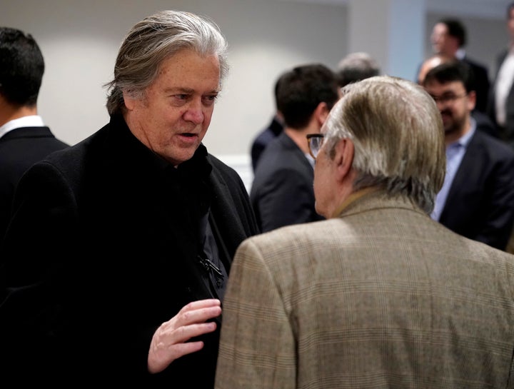 Former Trump aide Steve Bannon (left) talks with Olavo de Carvalho, the anti-globalist known as Brazilian President Jair Bolsonaro's "guru," at the Trump International Hotel on March 16.