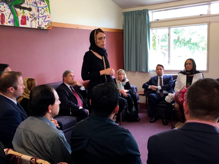 New Zealand Prime Minister Jacinda Ardern, left, speaks to representatives of the Muslim community, Saturday, March 16, 2019 at the Canterbury Refugee Centre in Christchurch, New Zealand.