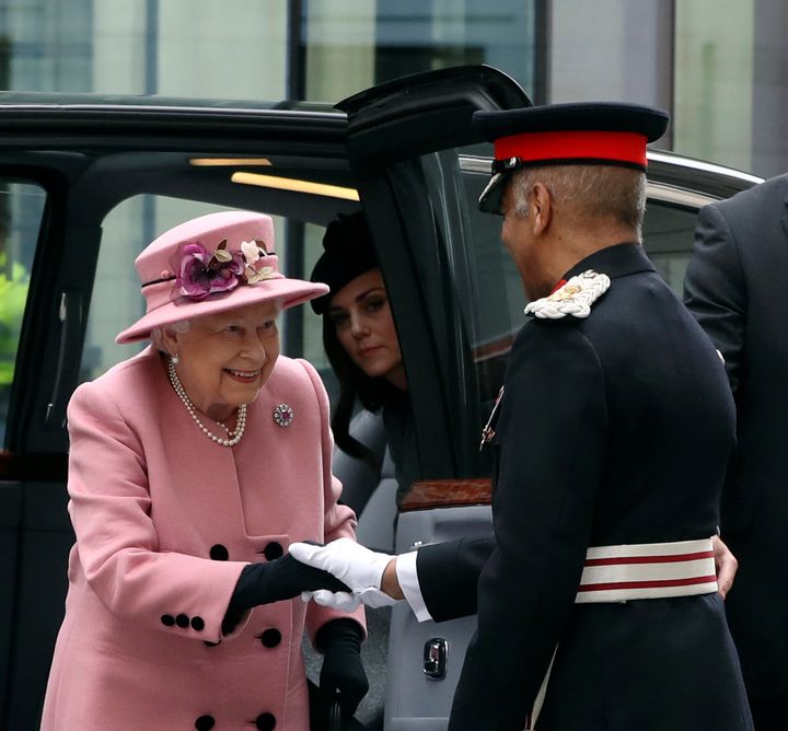 Queen Elizabeth and Catherine, Duchess of Cambridge arrive to open Bush House at King's College in London on Tuesday.