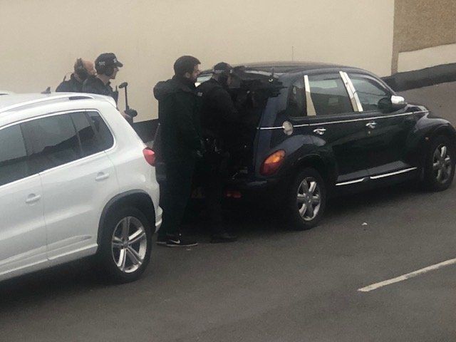 Armed police pictured at the scene of the incident on Tuesday afternoon.