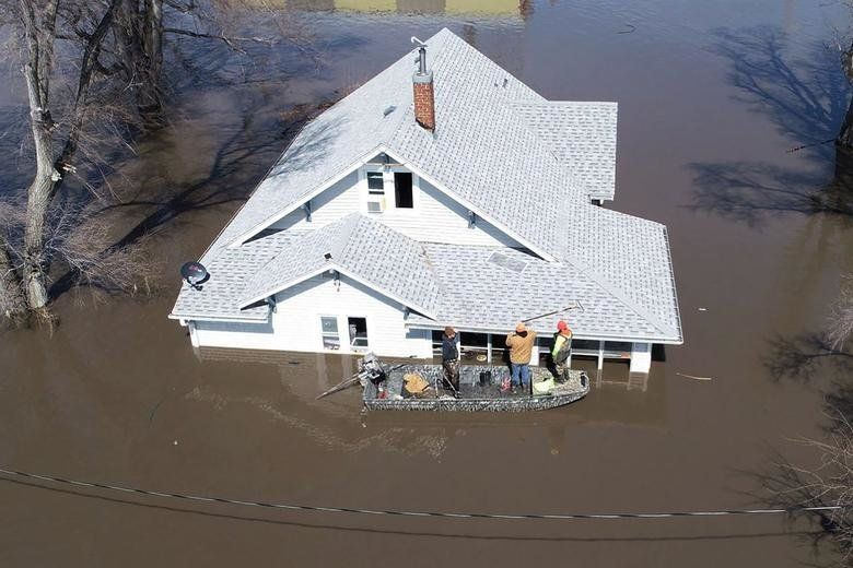 Flooding along rivers in western Michigan has damaged dozens of homes and businesses.