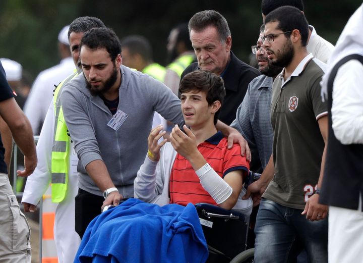 Zaed Mustafa, center in the wheelchair, is the brother of Hamza and son of Khalid Mustafa who were killed in the March 15 mosque shootings in Christchurch, New Zealand.