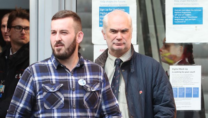 Protester James Goddard leaves Manchester Magistrates' Court, where he was charged with assault and a public order offence at a protest in Manchester city centre on February 9.