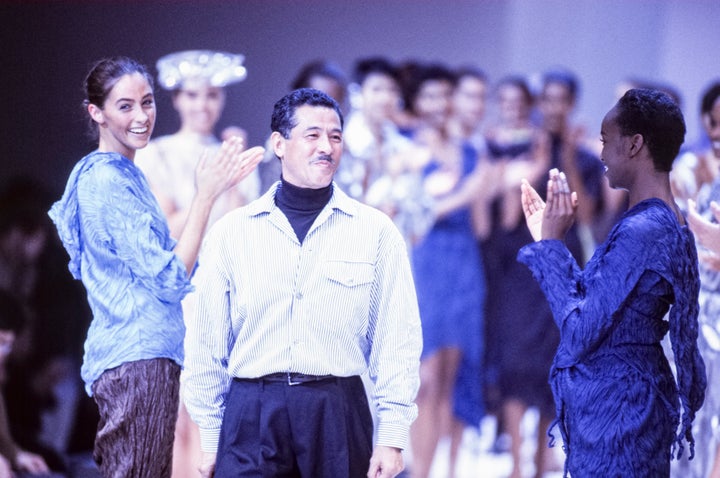 Issey Miyake with models at his spring 1992 runway presentation in France. 