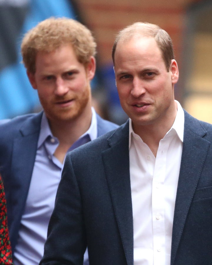 Prince Harry and Prince William attend a Christmas party for volunteers at The Mix youth service on Dec. 19, 2016, in London.