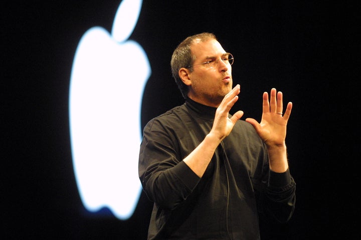 Steve Jobs wears an Issey Miyake black mock turtleneck at Apple's 2001 keynote address in San Francisco.