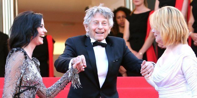 Roman Polanski au festival de Cannes 2017, entouré à sa droite par Eva Green et à sa gauche par son épouse...