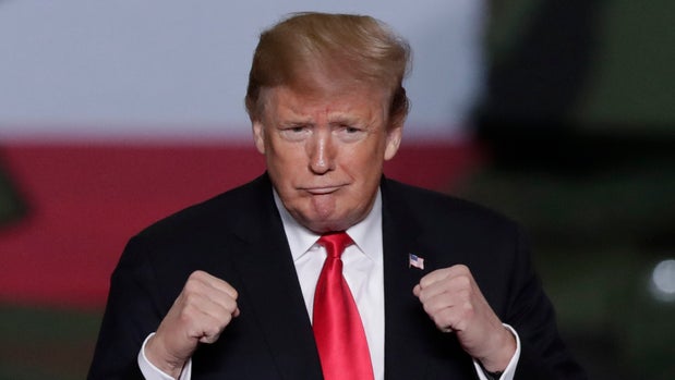 President Donald Trump takes the stage after speaking at Joint Systems Manufacturing Center in Lima, Ohio, Wednesday, March 20, 2019. (AP Photo/Michael Conroy)