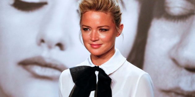 Actress Virginie Efira poses during a photocall as she attends the 2014 Lumiere Film Festival in Lyon,...