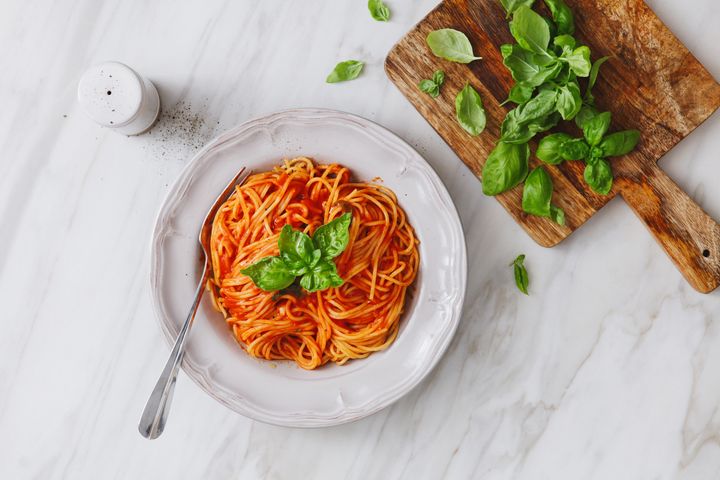 Don't rinse your pasta; the starch will help bind the tomatoes and olive oil to the noodles.