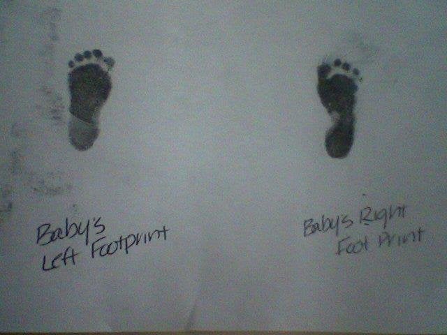 Azlend’s tiny footprints, taken just after his birth.