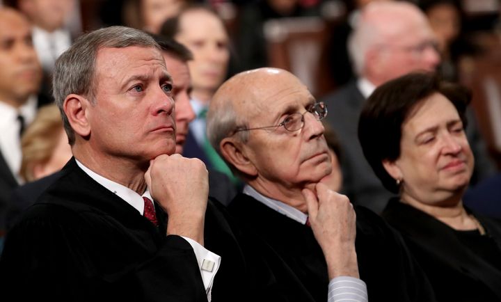 Supreme Court Chief Justice John Roberts, left, Associate Justice Stephen Breyer and Associate Justice Elena Kagan listens as President Donald Trump delivers his first State of the Union address on Jan. 30, 2018.