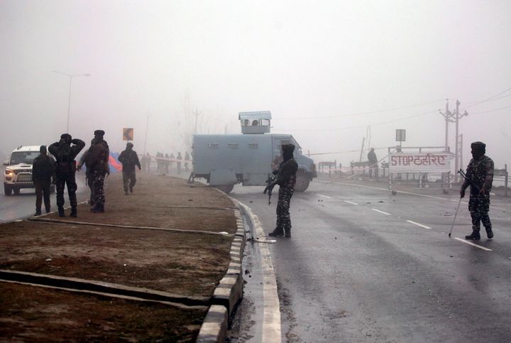 Soldiers at the site of Pulwama attack.