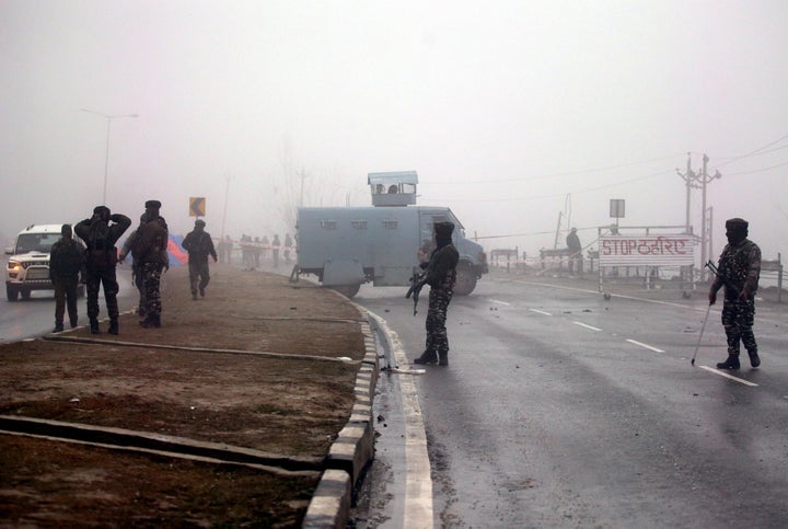 Soldiers at the site of Pulwama attack.