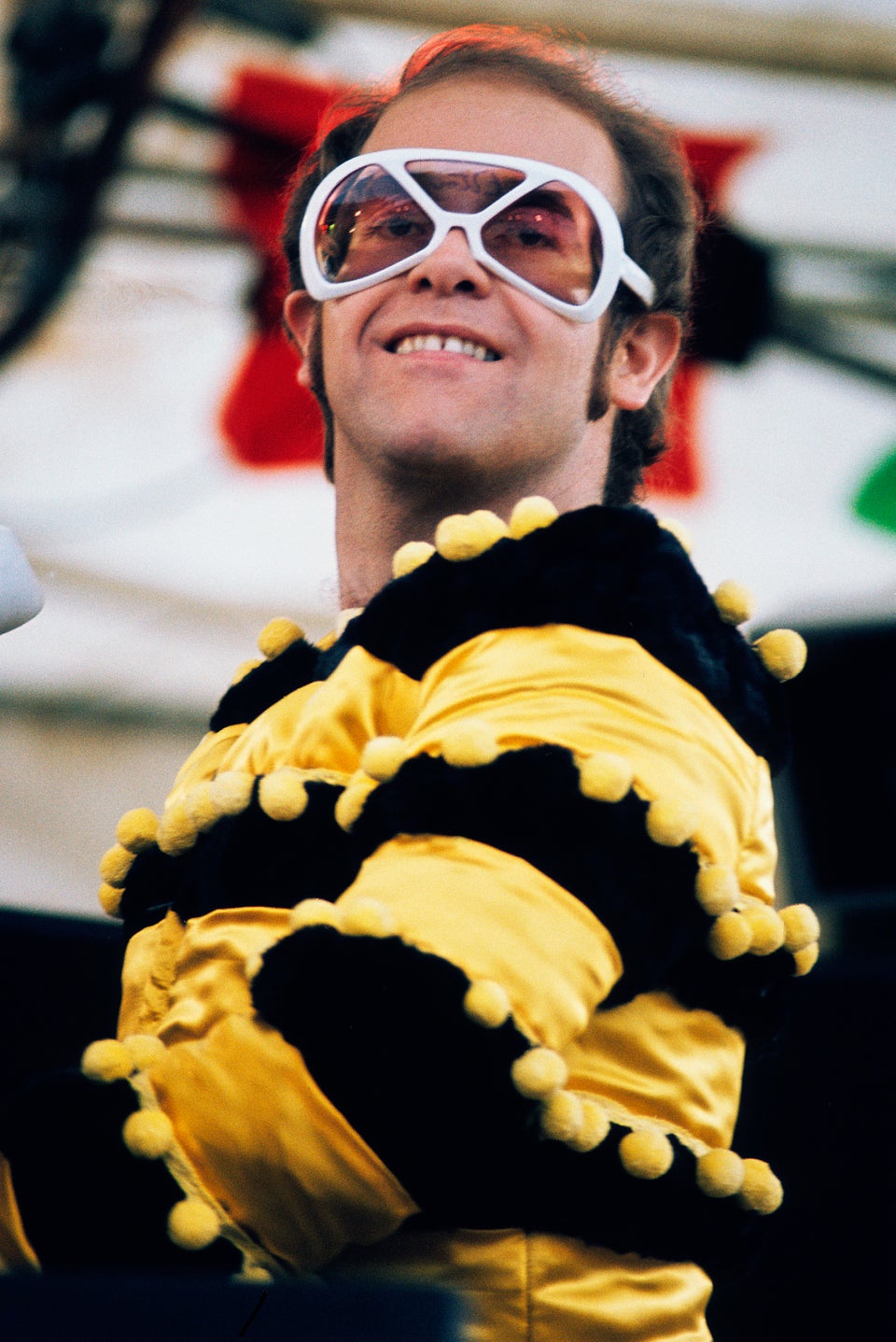 Photos: Elton John's Outfits Through the Years