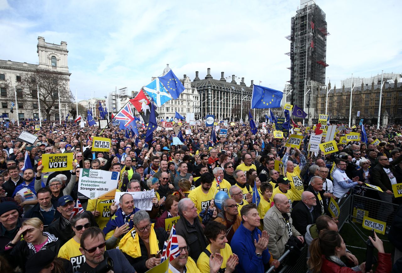 Protestors crowd Westminster's Parliament Square on Saturday.