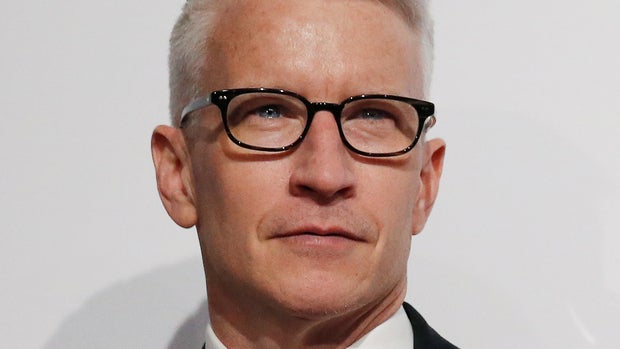 Anderson Cooper poses on the red carpet at the Billboard Magazine's 11th annual Women in Music luncheon in New York December 9, 2016.  REUTERS/Shannon Stapleton