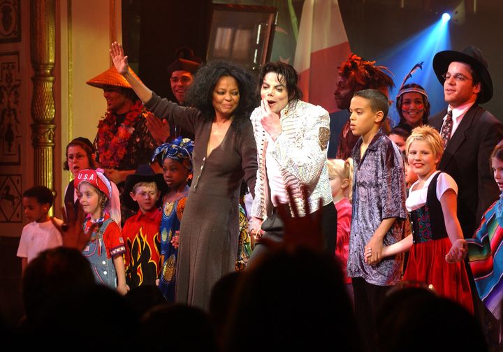 Diana Ross and Michael Jackson perform at a charity benefit.