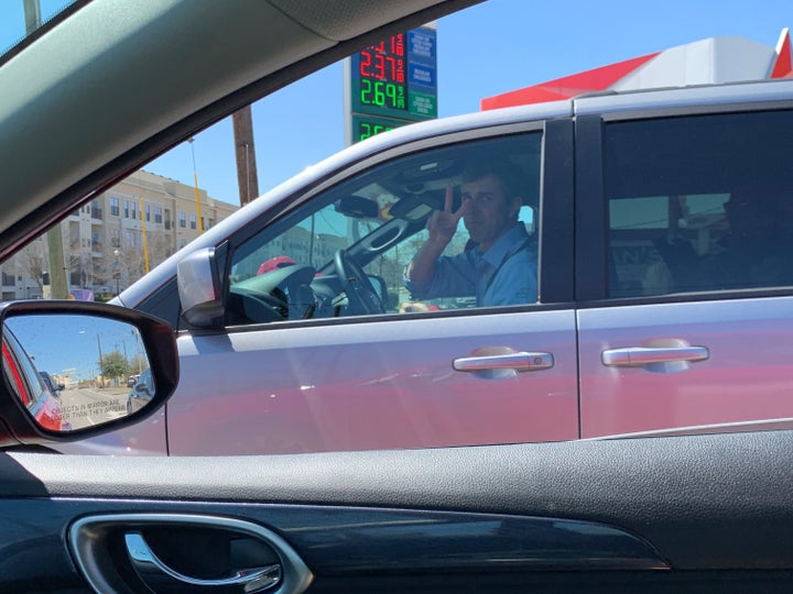 O'Rourke at the wheel in his gray Dodge Caravan.