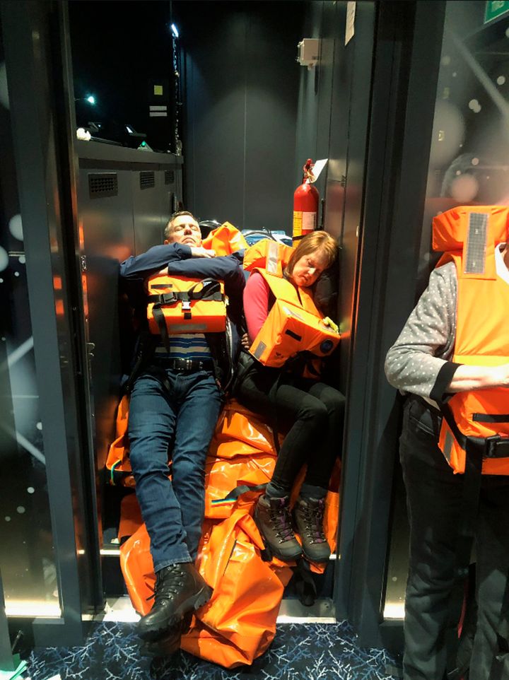 This photo provided by Alexus Sheppard shows passengers on board the Viking Sky, waiting to be evacuated, off the coast of Norway on Saturday, March 23, 2019. Rescue workers off Norway's western coast rushed to evacuate 1,300 passengers and crew from a disabled cruise ship by helicopter on Saturday, winching them one-by-one to safety as heaving waves tossed the ship from side to side and high winds battered the operation.