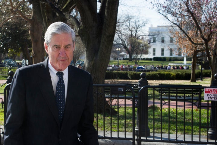 Special Counsel Robert Mueller walks past the White House, after attending St. John's Episcopal Church for morning services,
